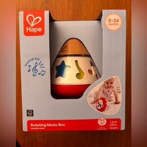 Hape Musical Rotating Toy - Brand New